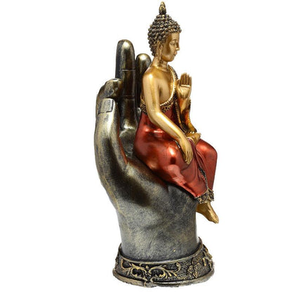 Decorative Thai Buddha Figurine - Gold and Red Sitting in a Hand - DuvetDay.co.uk