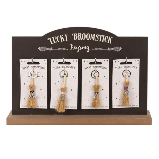 Set of 24 Lucky Broomstick Keyrings on Display - DuvetDay.co.uk